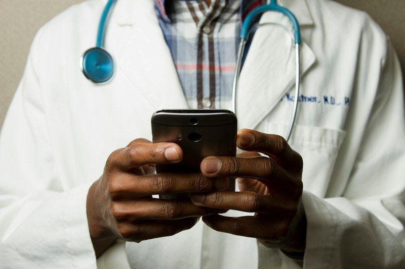 Medical doctors conducting routine health screening in a rural camp